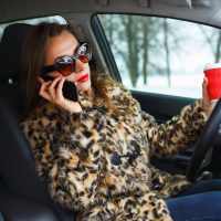 Lady drinking coffee:on phone