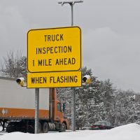 A truck Inspection sign